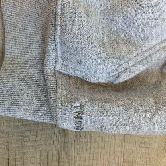 I am selling a gray TNA sweat shirt - Picture 2 of 4
